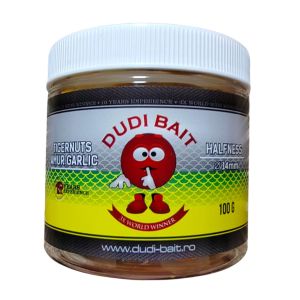 Протеиново топче Dudi Bait Tigernuts-Grass Carp “Halfness” Garlic 14mm 100g за риболов на шаран и амур – иновативен продукт с чеснов аромат и критично балансирана конструкция.